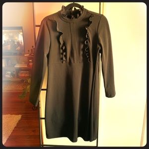 High neck, ruffled babydoll dress.